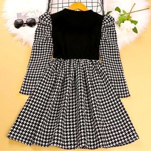 Fashionable girls fall/winter dress.